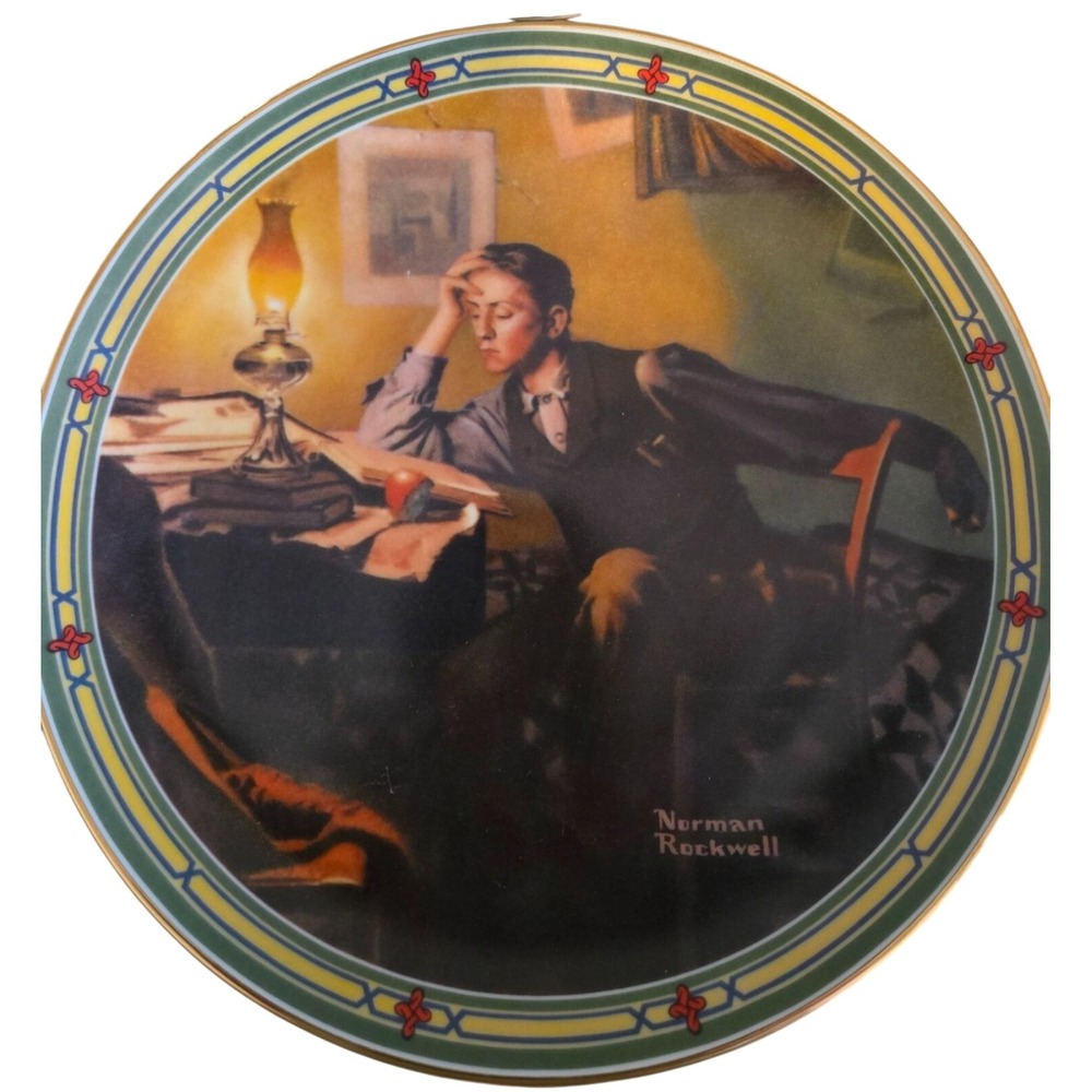 A numbered collector's plate titled "A Young Man's Dream" by Norman Rockwell, ma